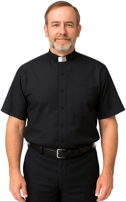Man wearing a black clerical shirt with a white collar on a white background
